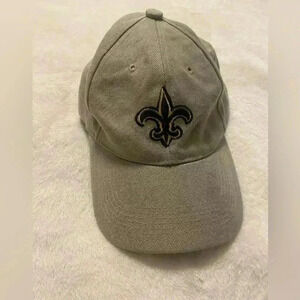Saints baseball cap with Fleur de lis on bib & SAINTS on the side. Adjustable